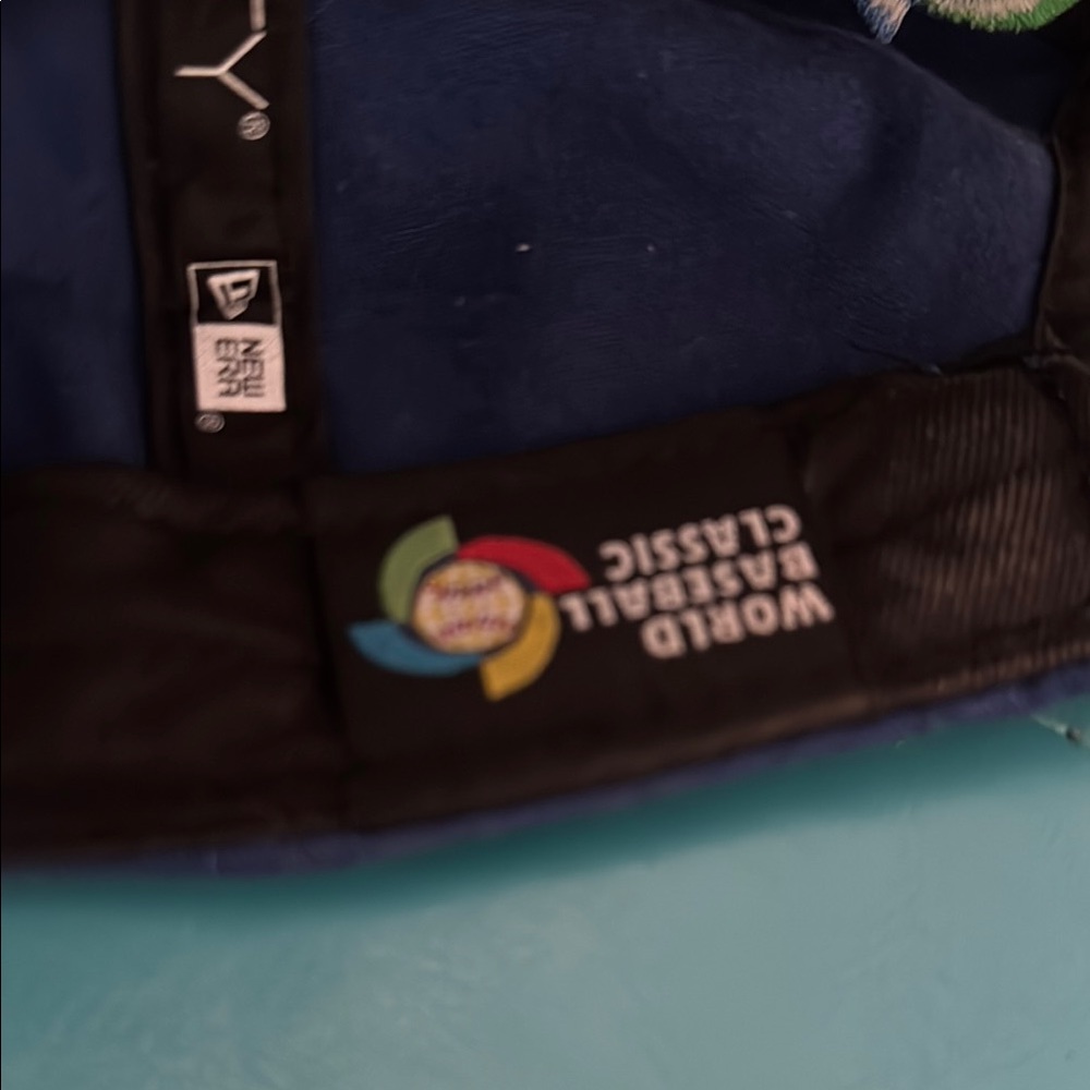 Blue hat with Yellow Lettering - Picture 2 of 3